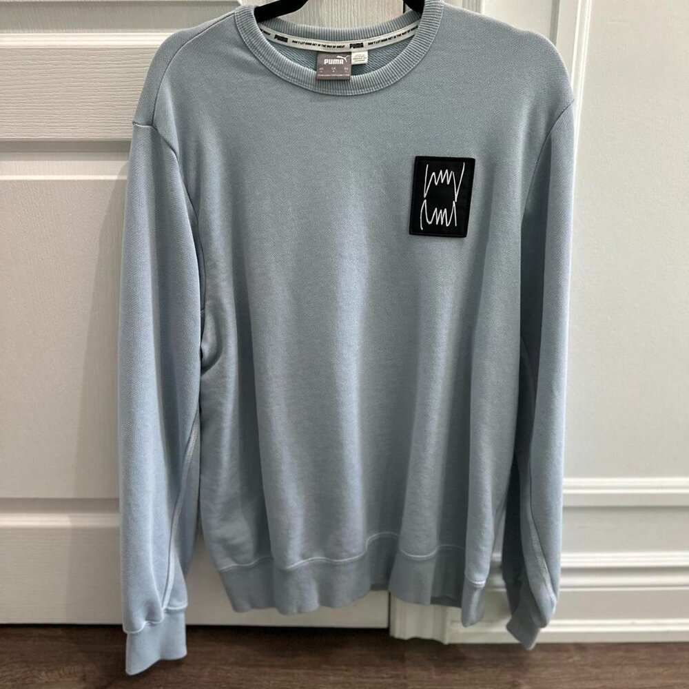 Puma sky blue crewneck sweatshirt with black logo patch